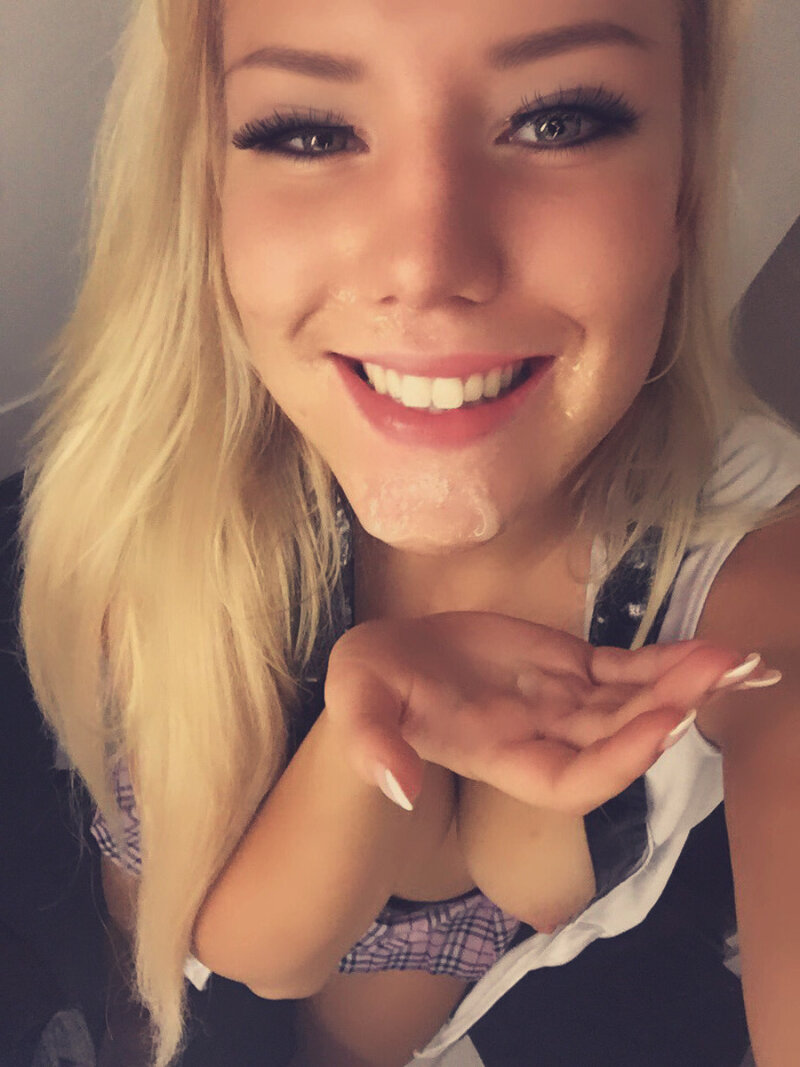 Beautiful blonde taking a selfie after a facial picture