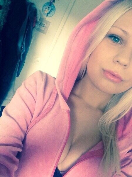 hot woman with cleavage in a hoody picture