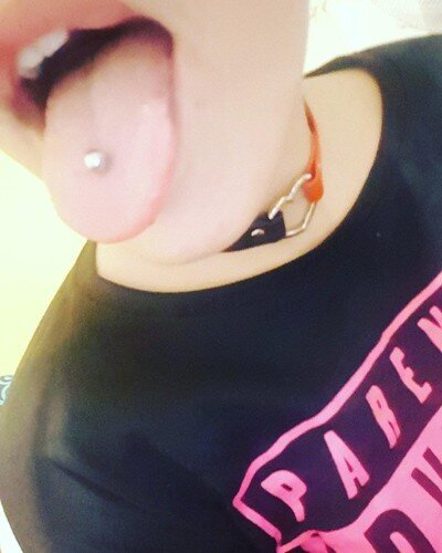 "A tongue piercing is a body piercing usually done directly through the center of the tongue" ;) picture