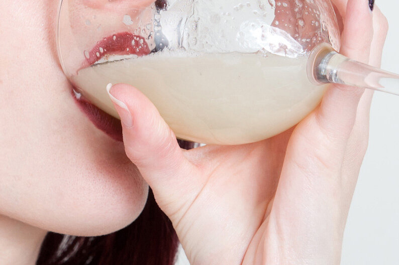 slut drinking wineglass of cum picture