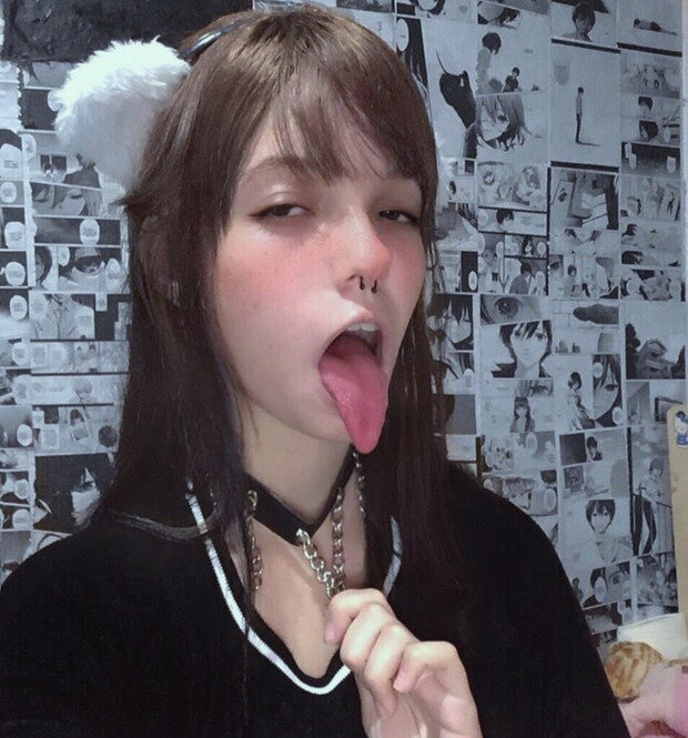 Pierced Nose Teen Sticks Tongue Out picture