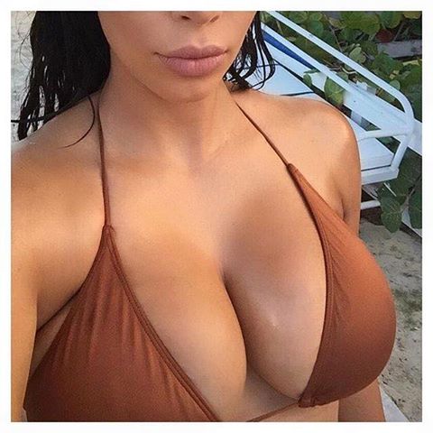 Kim Kardashian West Taking Selfie II picture