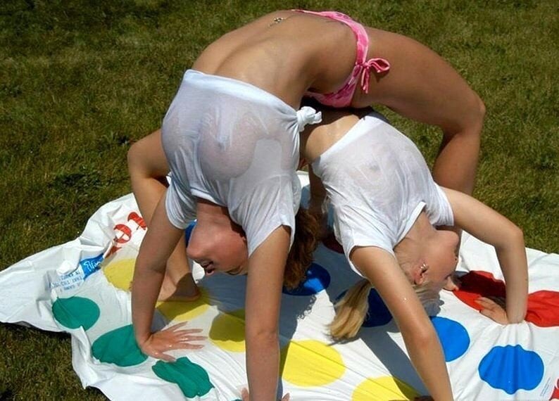 Twin gymnasts do back bends picture