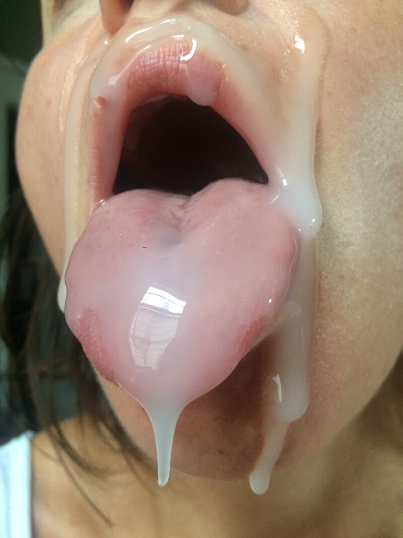 Amazing cum load facial, mouth open and tongue out, begging for more cum. picture