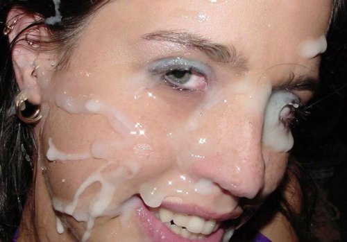 Slut gets cum bath from many men. picture