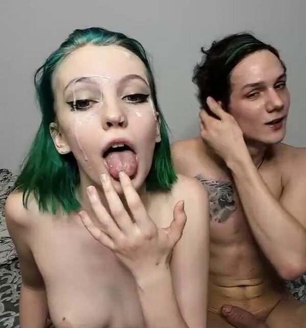 Green haired emo teen with a massive load of cum dripping off her face-See the HD video on our blog picture