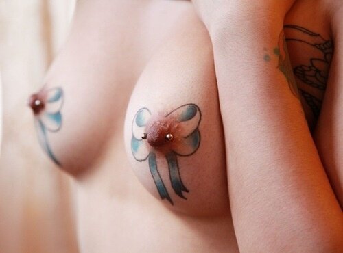 Nipple tattoos are never a good idea, but these look amazing picture