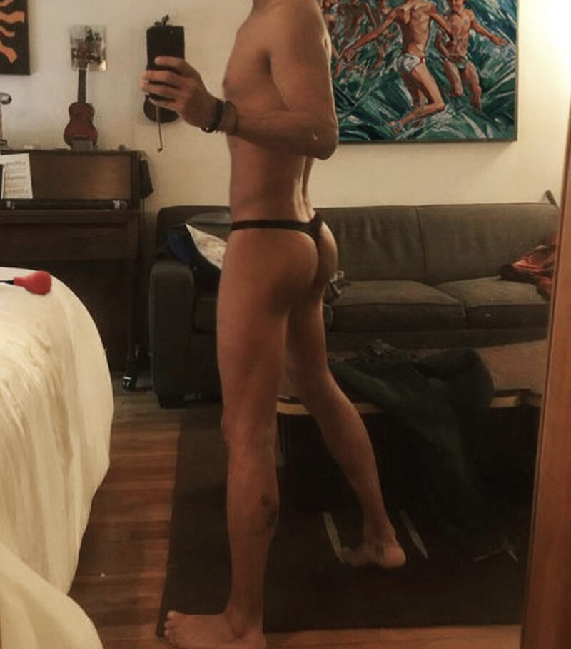 Fit guy showing ass in thong picture