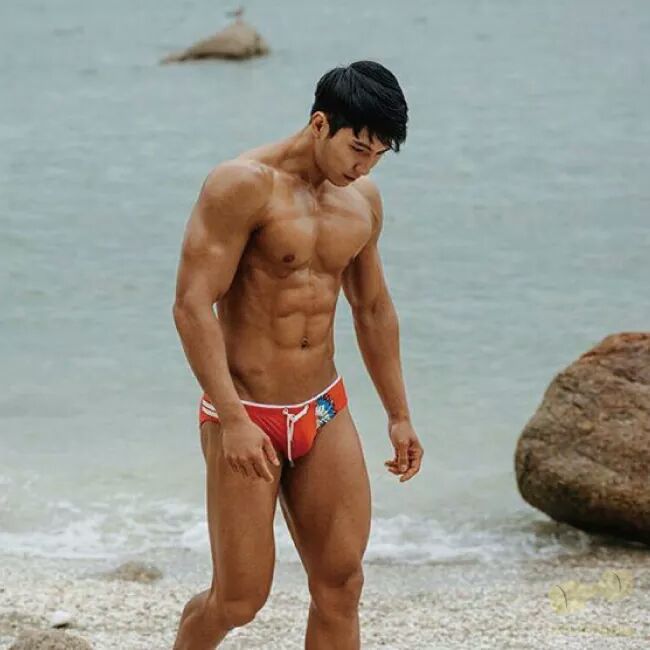 Cute asian guy on beach picture