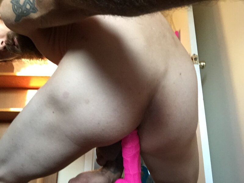 White guy rides pink dildo picture
