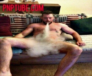 Gay pnp stud blowing clouds on his cock picture