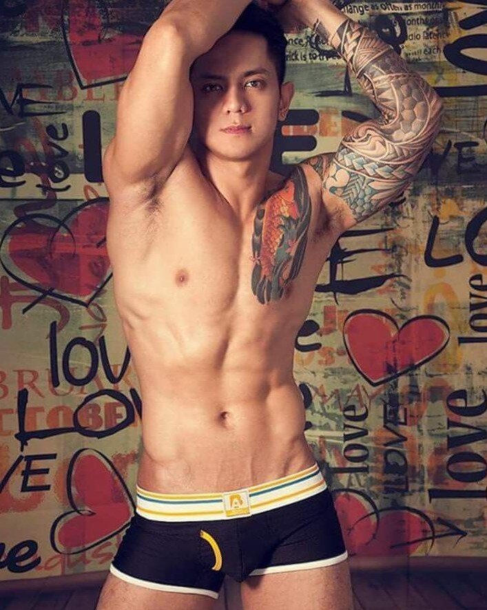 Amazing muscular body with tattoo picture