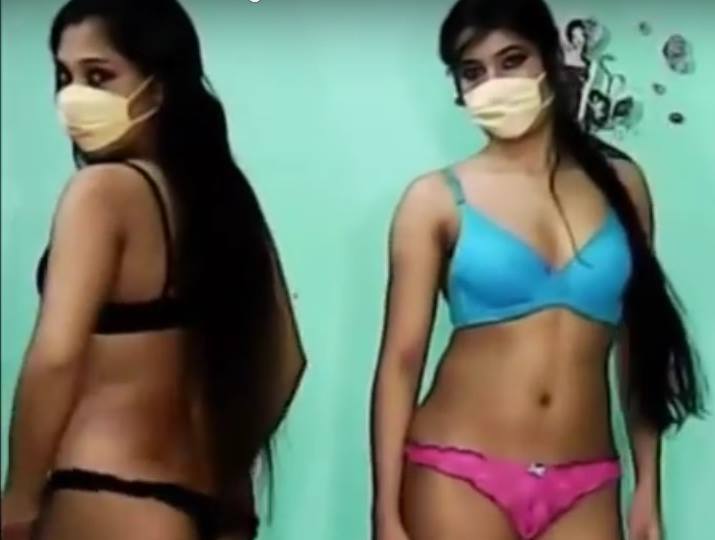 2印度的网络摄像头模特炫耀自己，但因为害羞而无法露脸。 picture