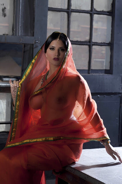 Busty solo babe Sunny Leone models solo in see thru Indian attire picture