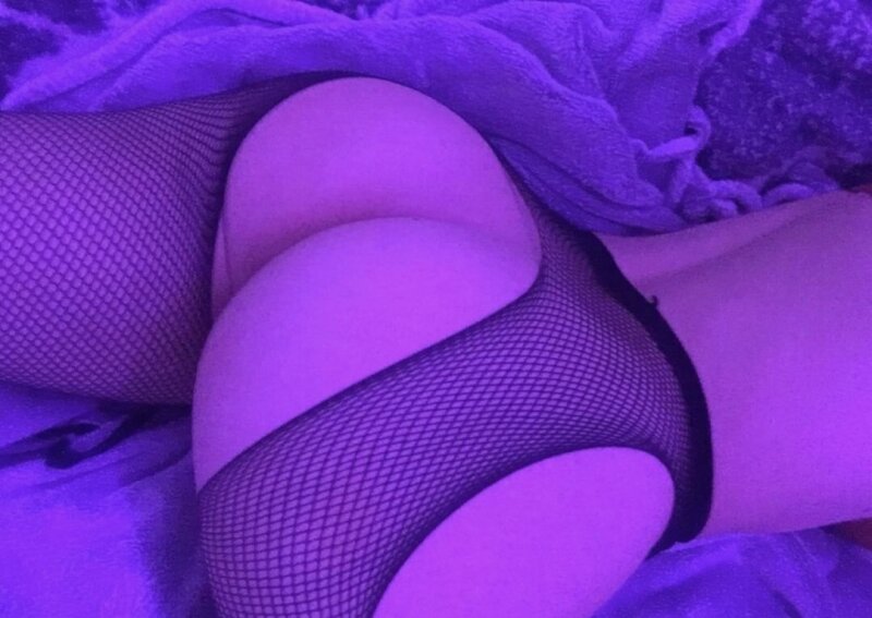 Slut with hot ass in fishnets picture