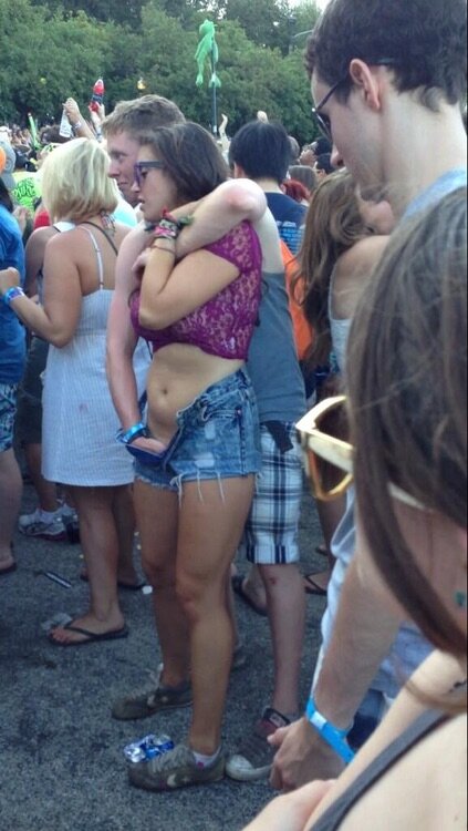 Fingering chick at concert picture