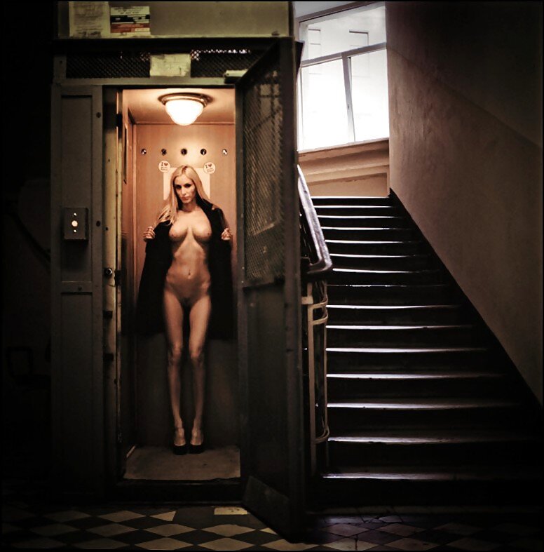 blonde exhibitionist woman in elevator picture
