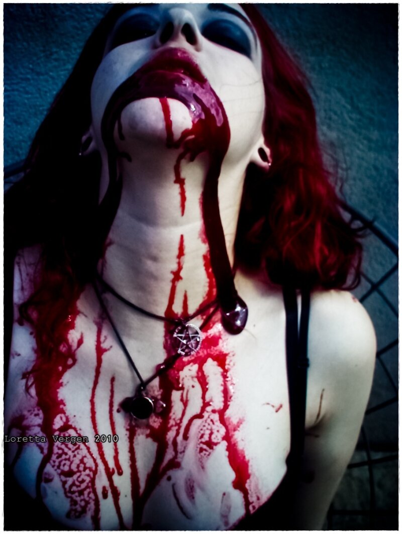 Just finished feeding on her hot girlfriends blood. Enjoying her blood. picture