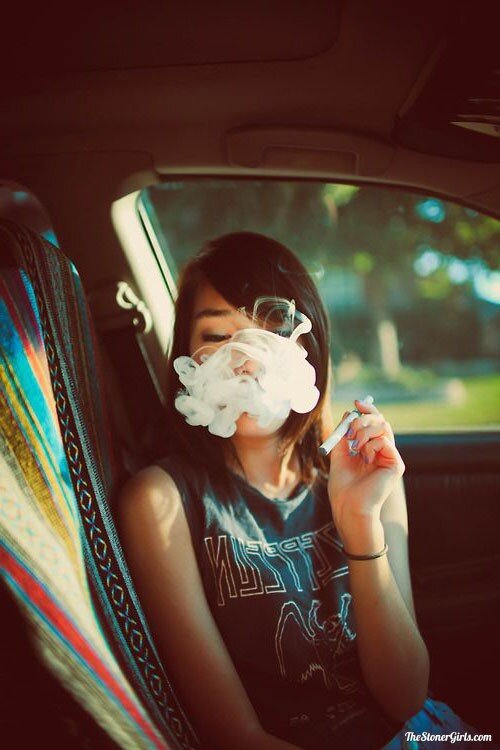 Beautiful girl smoking some weed picture