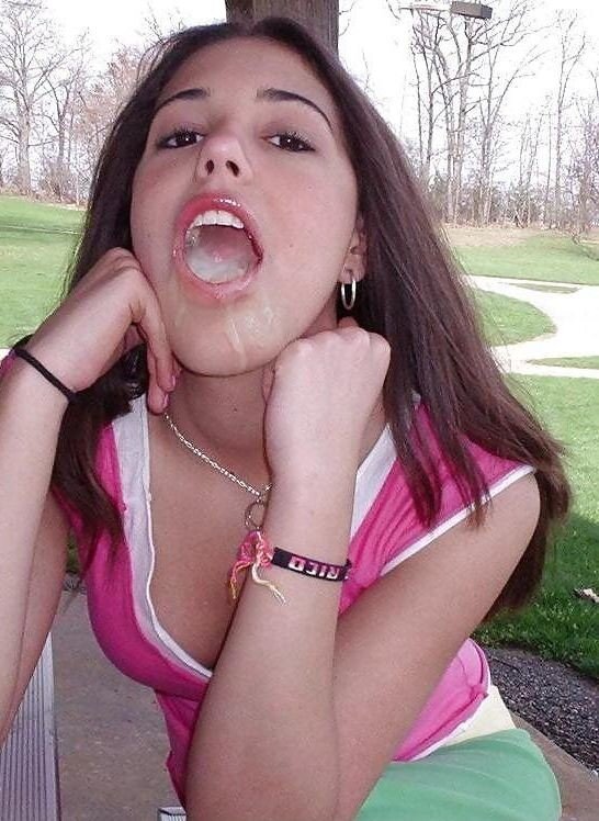 Pretty Latina teen with a mouthful of real cum in the park picture