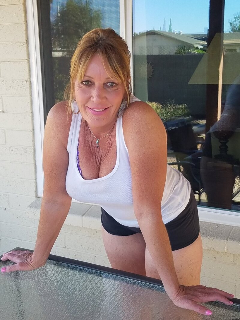 hot big tit milf in tank top and shorts picture