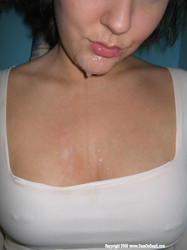 Cum covered mouth and drips onto tits. picture