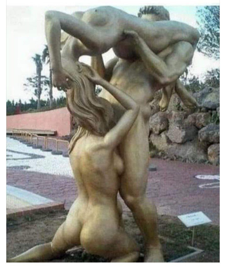 Threesome statue with two woman and one man licking together picture