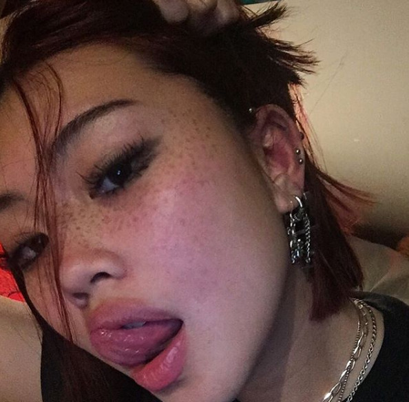 Beautiful face tongue out freckles sexy non-nude picture