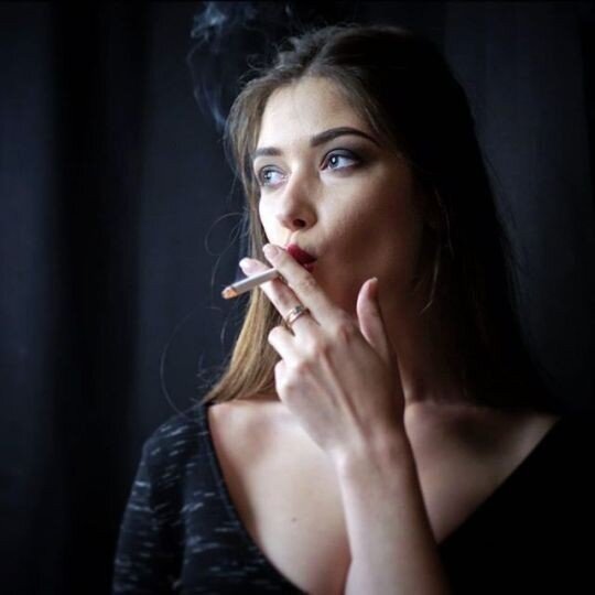 Brunette smoking. picture