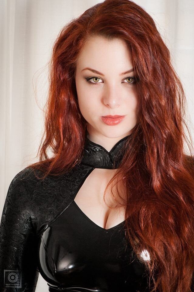 Eyes of a Redhead in latex picture