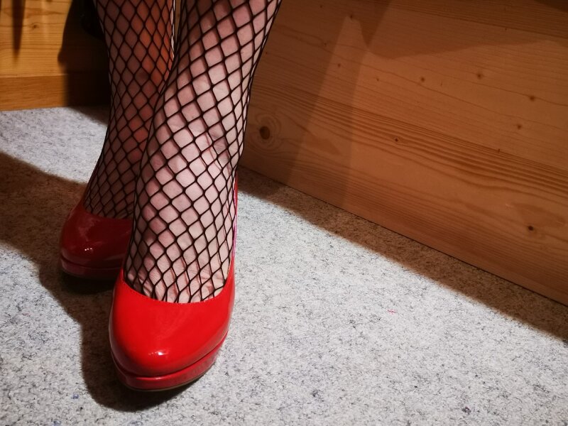 Kırmızı topuklu ayakkabılar. Sıcak ve seksi picture
