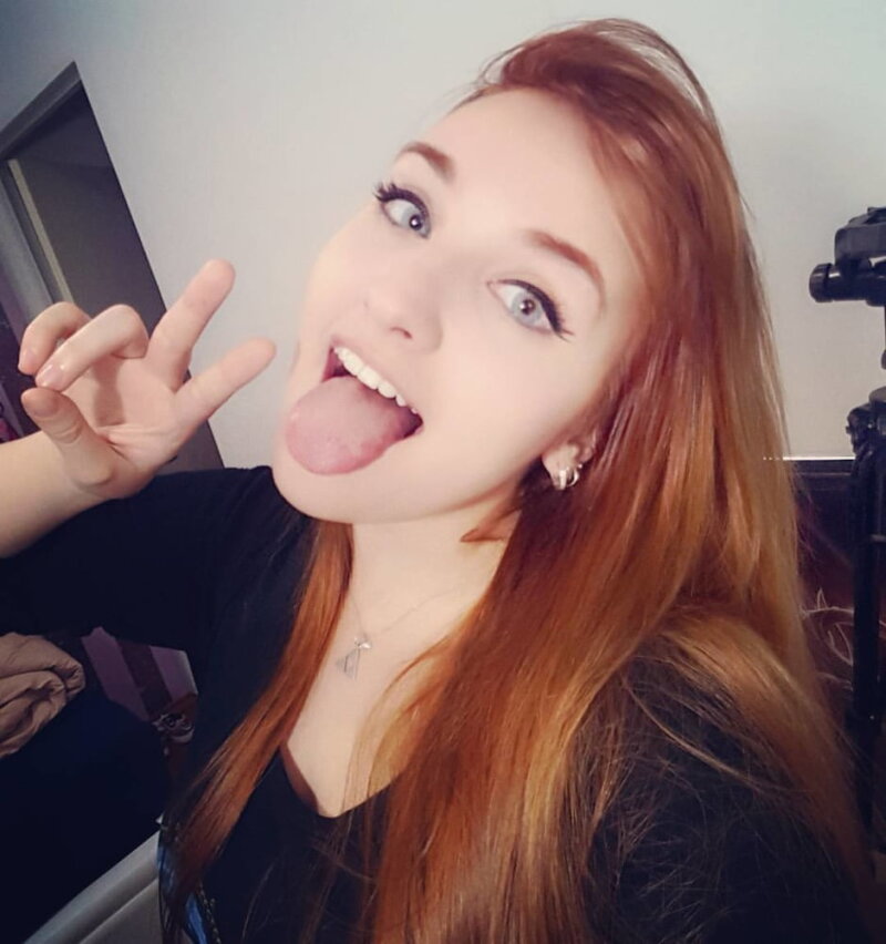 redhead tongue out picture