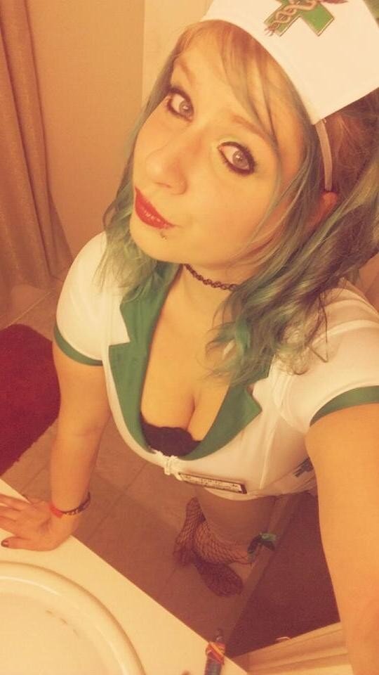 Mysterious Amatuer Facebook Babe in Nurse Cleavage Outfit picture