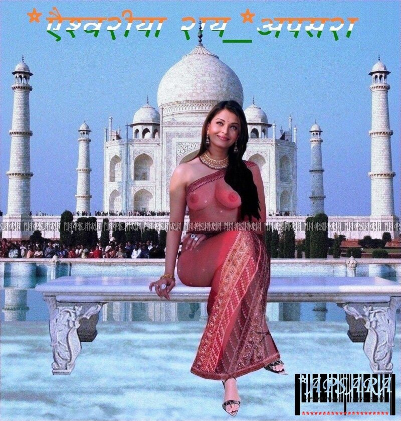 aishwarya rai attracting crowd at the tajmahal,posing in a red transparent sari without wearing a blouse showing her perfect breasts & large picture