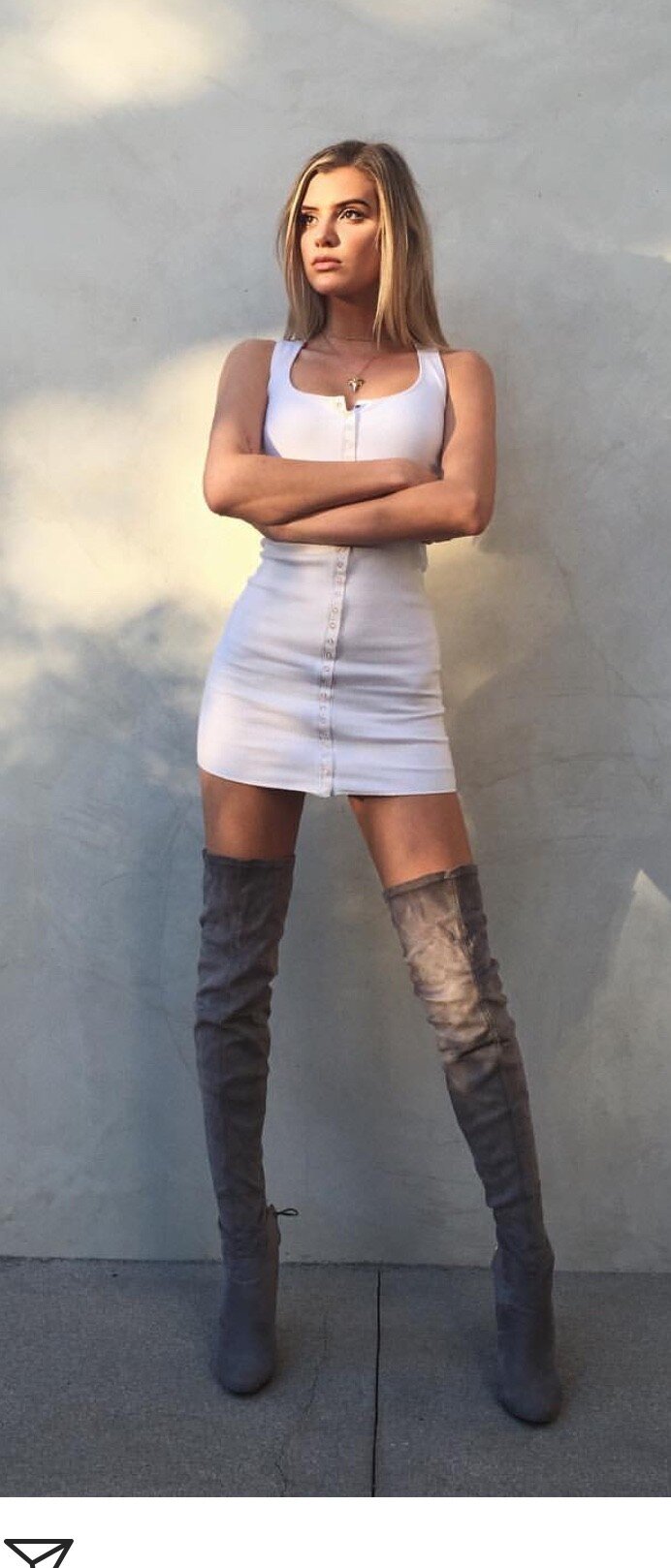 Alissa Violet is looking sexy as hell in white dress with long gray boots picture