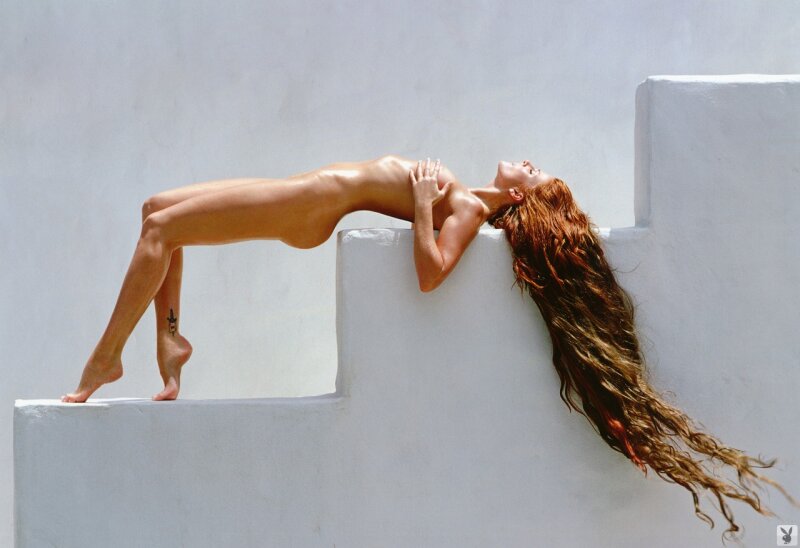 Artistic nude photo of Angie laid out in the sun. picture