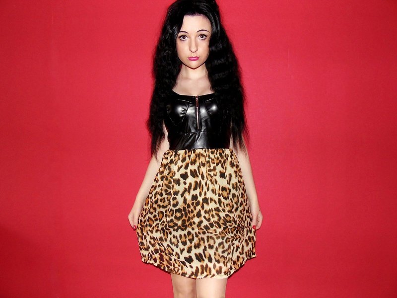 Brunette bimbo doll in her new outfit picture
