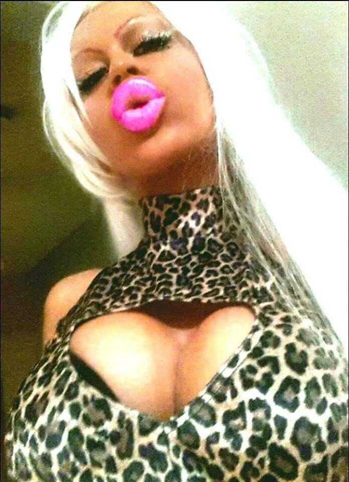 Barbie Jade is a skank with big silly plump pink lips - leopard skin shirt - fota lipz picture