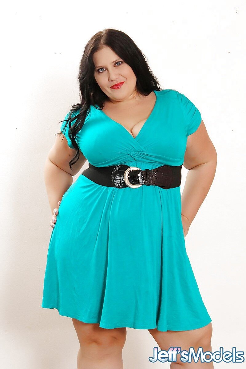 Brunette BBW Becki Butterfly looking hot in a blue dress picture