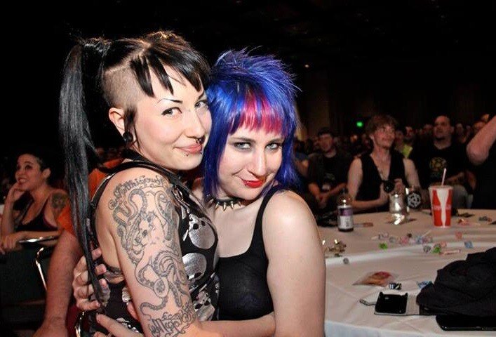 Emo goths Paraquat Suicide & blue haired friend give each other a hug as goth friend is her arm candy - SGB gothh picture