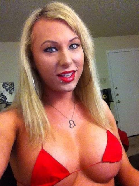 Bimbo is amateur slut in little red bikinis as Ventura Slutson has large tits & boobs with a smile& a heart necklace - SGB picture