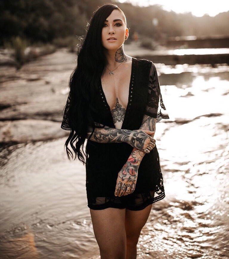 Goth alt model Genevieve Zitricki babe with half shaved 2face hair with side boob cleavage of natural almost large breasts - SGB gothh picture