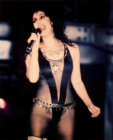 Cher Bono singing in a sexy outfit. picture