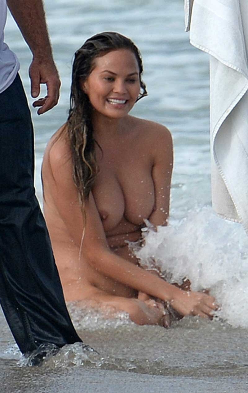 One Very Naked Chrissy Teigen in the Ocean Surf picture