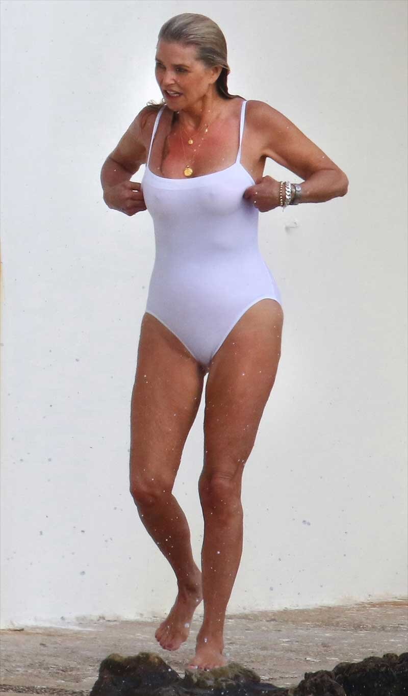 Christie Brinkley Nipples in Wet White Bathing Suit picture