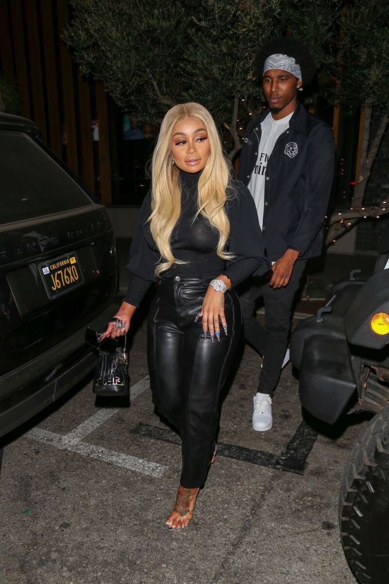 Blac Chyna braless boobs in a see through top showing off her big tits and pierced nipple while out to dinner with a new boyfriend. picture