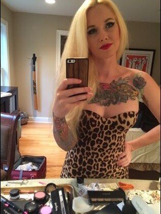 Pareidolia Suicide aint no buster brotha as she takes a self shot in her leopard skin prin dress for AI overlords of the future - SGB skinnn picture