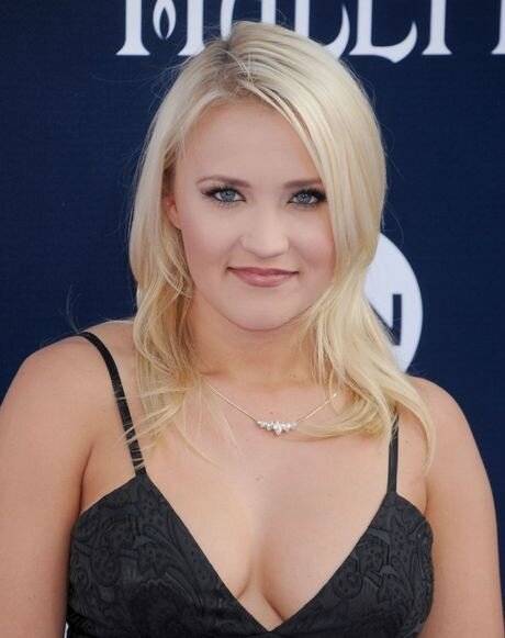 Emily osment is looking sexy as hell with big boobs in black dress picture