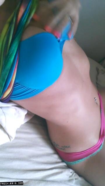 Freckles 18 rubbing body with glimpse of her glasses picture