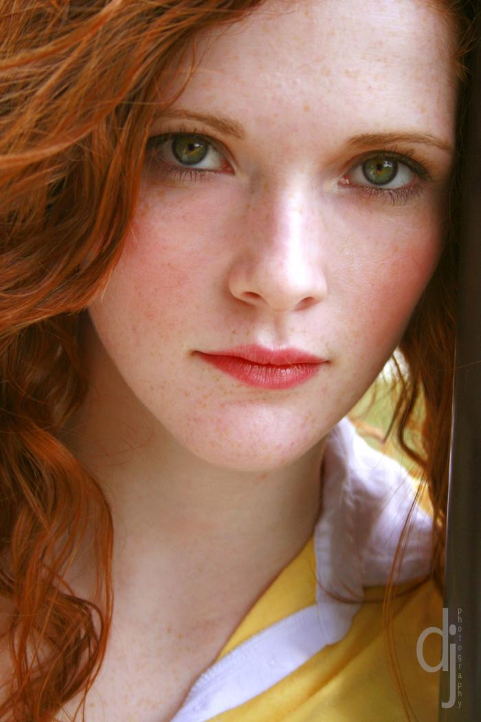 Meagan Colf is one hot pale redhead with sexy green eyes picture